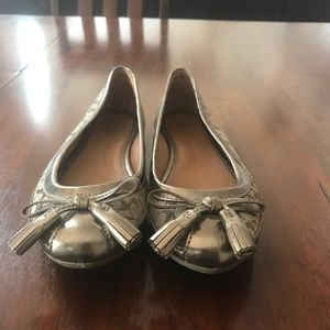 Signature Coach flats.